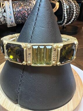 Lia Sophia gold-tone bracelet with green crystals